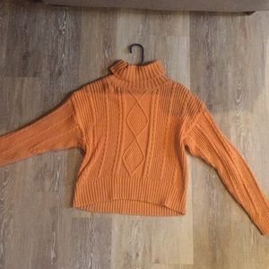 Jeanne Pierre orange cable knit sweater